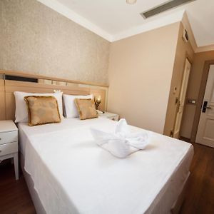 Kamer met een Queen Size Bed